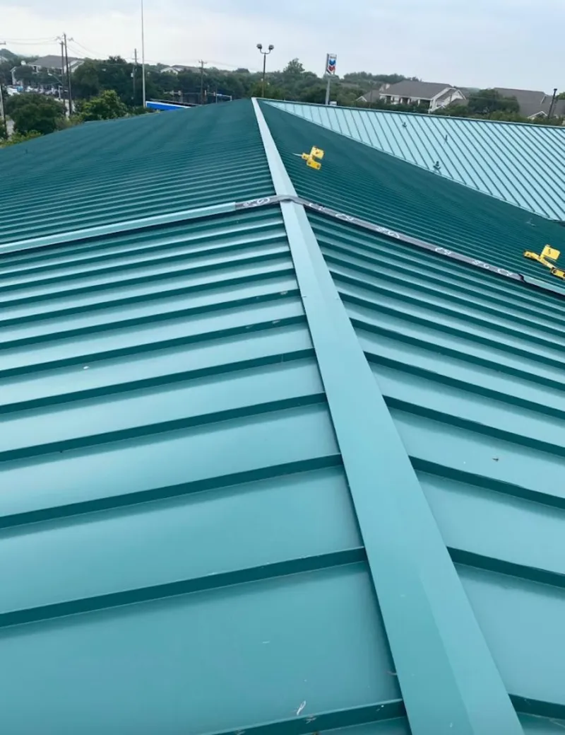 Green commercial metal roof ridge and valley for Metal Roof Repair in La Plata